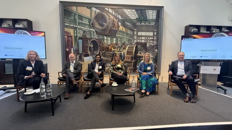 Panel discussion members on stage